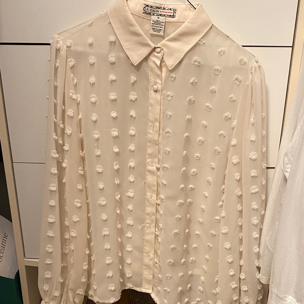 Chic Cream Button-Up Blouse with Textured Dots